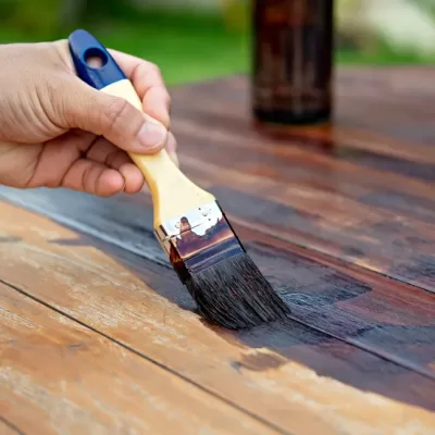 Hand,Painting,Oil,Color,On,The,Wooden,Table.