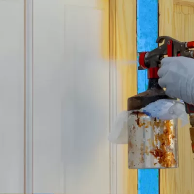 Hand,With,Painting,The,Door,With,A,Spray,Gun