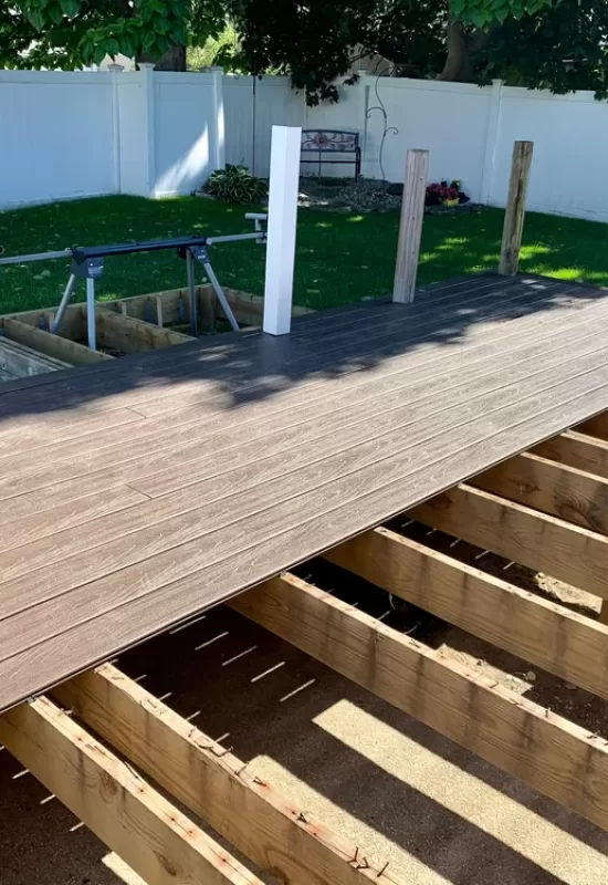 Remodeling,A,Deck,In,A,Suburban,Backyard.,The,Contractor,Is