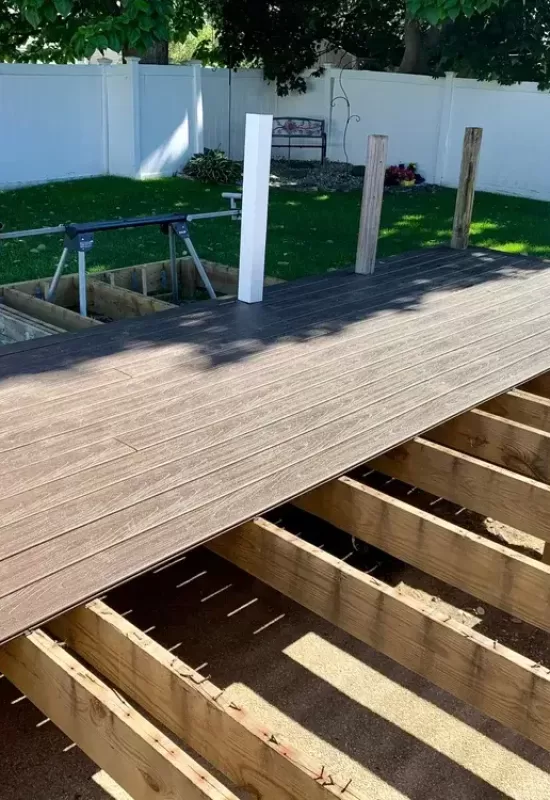 Remodeling,A,Deck,In,A,Suburban,Backyard.,The,Contractor,Is