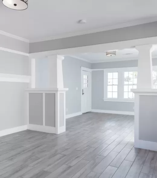 Living,Room,Interior,After,Remodelling,With,Fire,Place,And,Grey